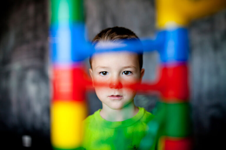 child looking at fun marble run